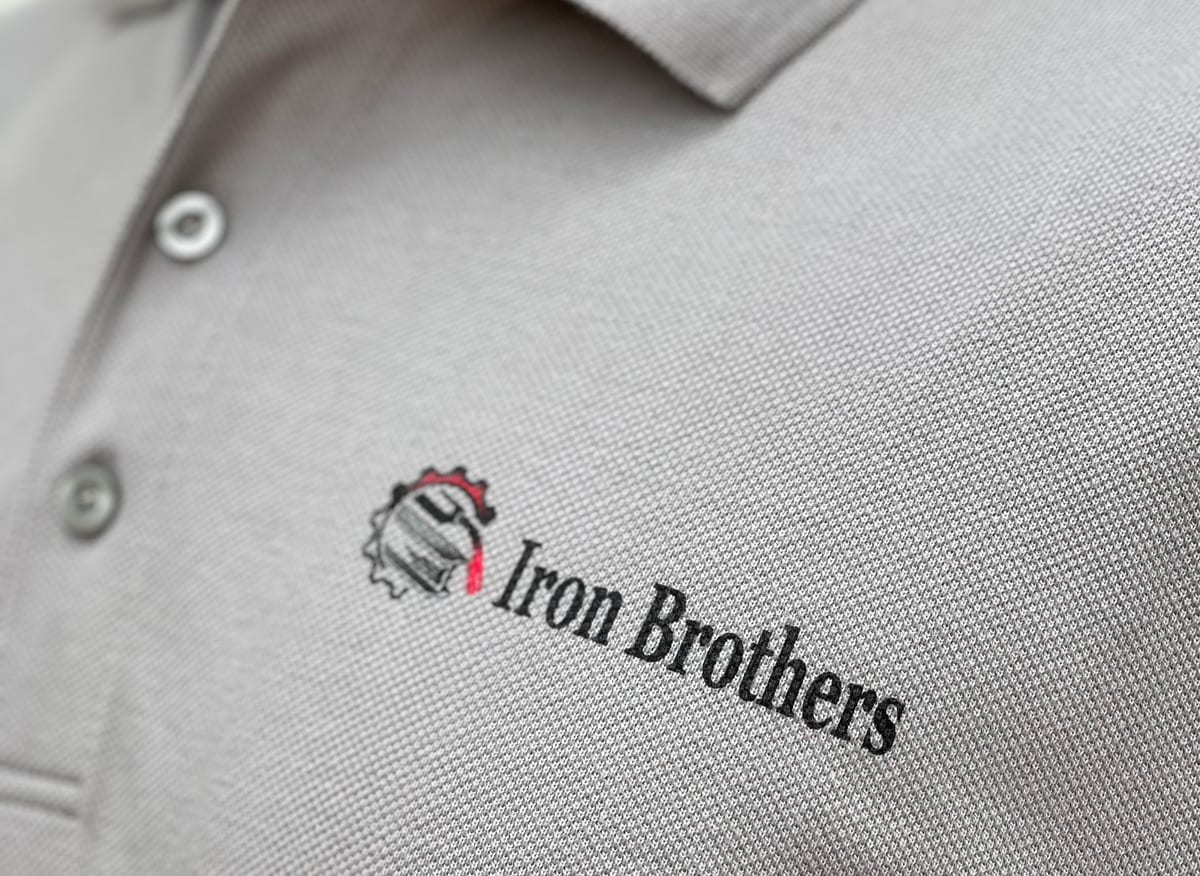 Embroidered Iron Brothers polo, same logo by Art Printing Vehicle Wraps, Sacramento